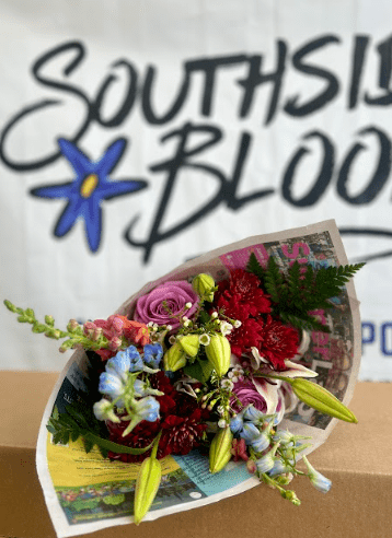 Screenshot-2024-03-29-103312 Flower bouquet wrapped in newspaper